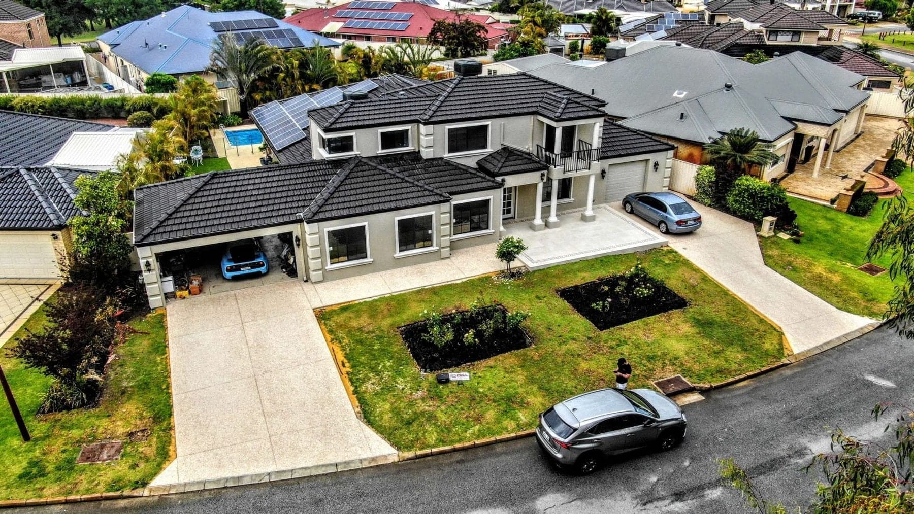 Decorative concrete driveway installed by D&L Concrete Services in Perth